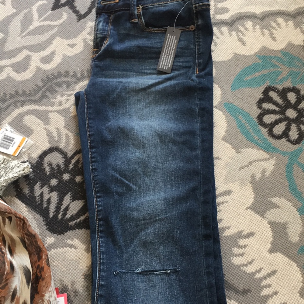 Brand New Jeans with whole on knee